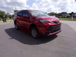 Red Toyota Sienna with BraunAbility Side Entry Automatic Fold Out conversion