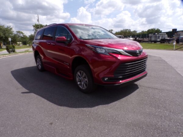 Red Toyota Sienna with BraunAbility Side Entry Automatic Fold Out conversion