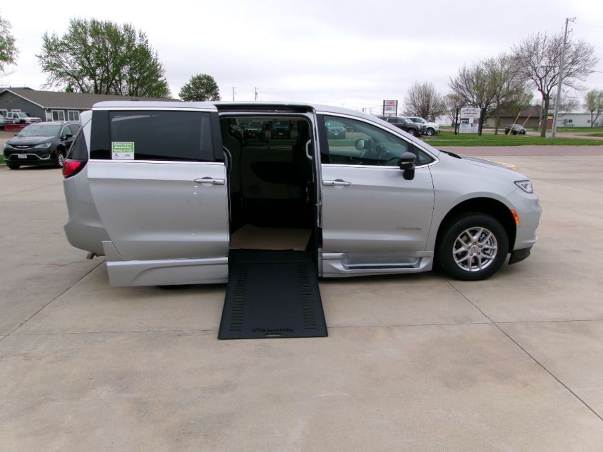 Silver Chrysler Pacifica with BraunAbility Side Entry Automatic In Floor conversion