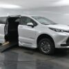 White Toyota Sienna with BraunAbility Side Entry Automatic Fold Out conversion