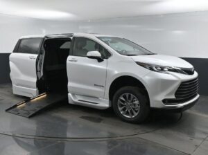 White Toyota Sienna with BraunAbility Side Entry Automatic Fold Out conversion