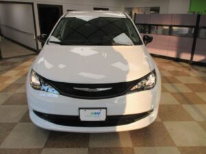White Chrysler Voyager with Driverge Side Entry Automatic Fold Out conversion