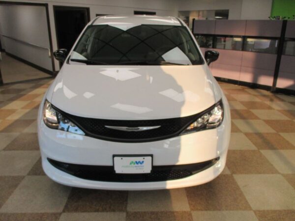 White Chrysler Voyager with Driverge Side Entry Automatic Fold Out conversion