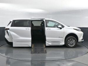 White Toyota Sienna with BraunAbility Side Entry Automatic Fold Out conversion