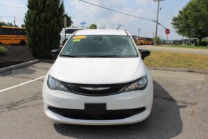 White Chrysler Voyager with Driverge Side Entry Automatic Fold Out conversion