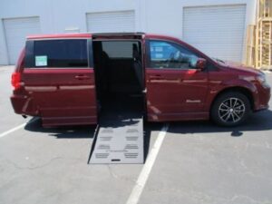 Red Dodge Grand Caravan with BraunAbility Side Entry Automatic Fold Out conversion