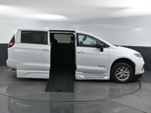 White Chrysler Pacifica with BraunAbility Side Entry Automatic Fold Out conversion