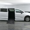 White Chrysler Pacifica with BraunAbility Side Entry Automatic Fold Out conversion