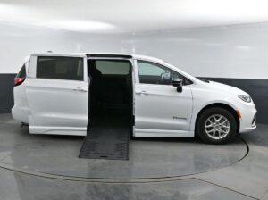 White Chrysler Pacifica with BraunAbility Side Entry Automatic Fold Out conversion