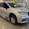 Silver Chrysler Pacifica with BraunAbility Side Entry Automatic In Floor conversion