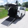 White Toyota Sienna with Driverge Rear Entry Manual Fold Out conversion