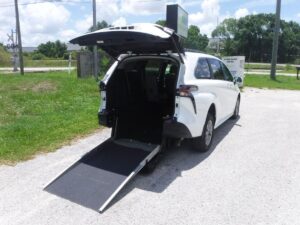 White Toyota Sienna with Driverge Rear Entry Manual Fold Out conversion