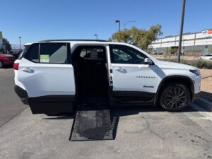 White Chevrolet Traverse with BraunAbility Side Entry Automatic In Floor conversion