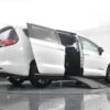 White Chrysler Voyager with BraunAbility Side Entry Manual Fold Out conversion