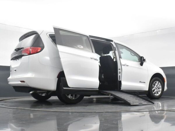 White Chrysler Voyager with BraunAbility Side Entry Manual Fold Out conversion