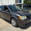 Grey Dodge Grand Caravan with Driverge Side Entry Automatic Fold Out conversion