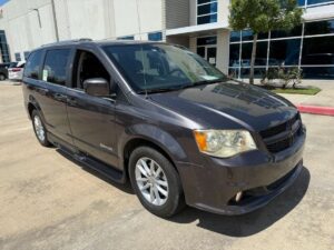 Grey Dodge Grand Caravan with Driverge Side Entry Automatic Fold Out conversion