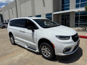 White Chrysler Pacifica with BraunAbility Side Entry Automatic In Floor conversion