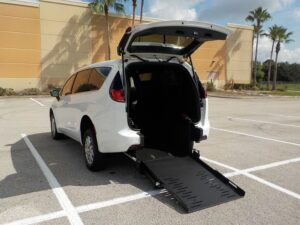 White Chrysler Pacifica with FR Conversions Rear Entry Manual Fold Out conversion