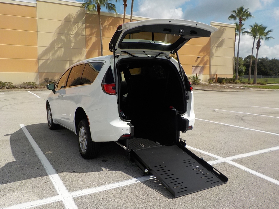 White Chrysler Pacifica with FR Conversions Rear Entry Manual Fold Out conversion