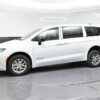White Chrysler Voyager with BraunAbility Rear Entry Manual Fold Out conversion