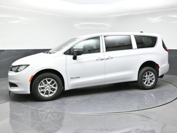White Chrysler Voyager with BraunAbility Rear Entry Manual Fold Out conversion