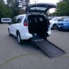 White Chrysler Voyager with BraunAbility Rear Entry Manual Fold Out conversion