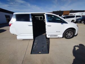 White Honda Odyssey with BraunAbility Side Entry Automatic Fold Out conversion