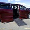 Red Chrysler Voyager with BraunAbility Side Entry Automatic Fold Out conversion