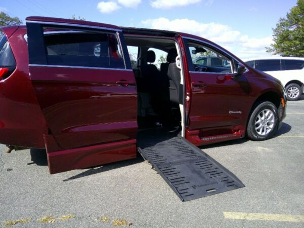 Red Chrysler Voyager with BraunAbility Side Entry Automatic Fold Out conversion