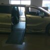 Silver Honda Odyssey with BraunAbility Side Entry Automatic In Floor conversion