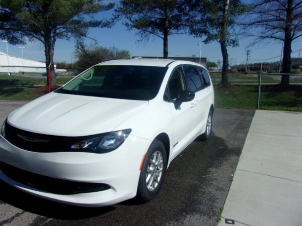 White Chrysler Voyager with Driverge Side Entry Automatic Fold Out conversion