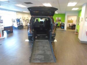 Orange Toyota Sienna with Vantage Mobility Rear Entry Manual Fold Out conversion
