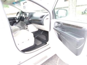 White Dodge Grand Caravan with BraunAbility Side Entry Manual Fold Out conversion