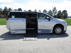 Silver Chrysler Pacifica with BraunAbility Side Entry Automatic In Floor conversion