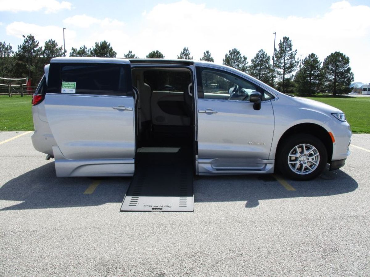 Silver Chrysler Pacifica with BraunAbility Side Entry Automatic In Floor conversion