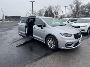 Silver Chrysler Pacifica with Driverge Side Entry Automatic Fold Out conversion