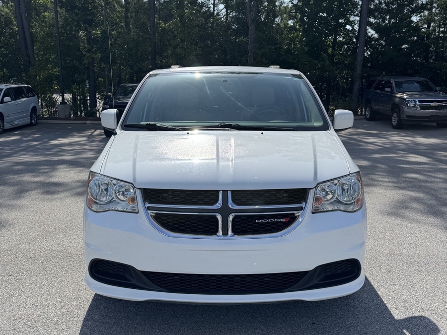 White Dodge Grand Caravan with BraunAbility Side Entry Manual Fold Out conversion