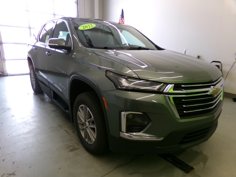 Silver Chevrolet Traverse with BraunAbility Side Entry Automatic In Floor conversion