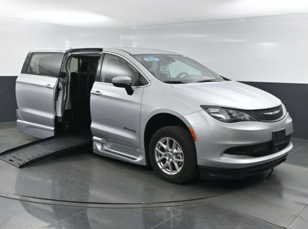 Silver Chrysler Voyager with BraunAbility Side Entry Automatic Fold Out conversion