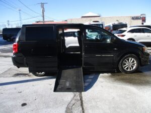 Black Dodge Grand Caravan with BraunAbility Side Entry Manual Fold Out conversion