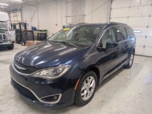 Blue Chrysler Pacifica with Adaptive Vans Side Entry Automatic Fold Out conversion