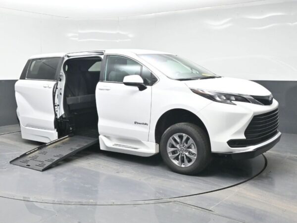 White Toyota Sienna with BraunAbility Side Entry Automatic Fold Out conversion