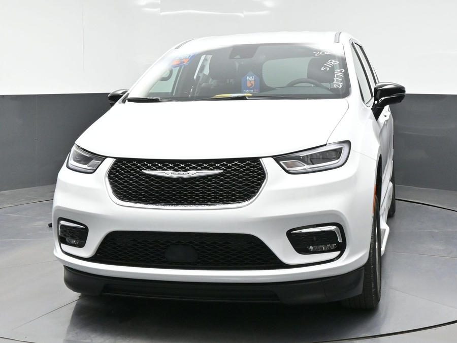 White Chrysler Pacifica with BraunAbility Side Entry Automatic Fold Out conversion