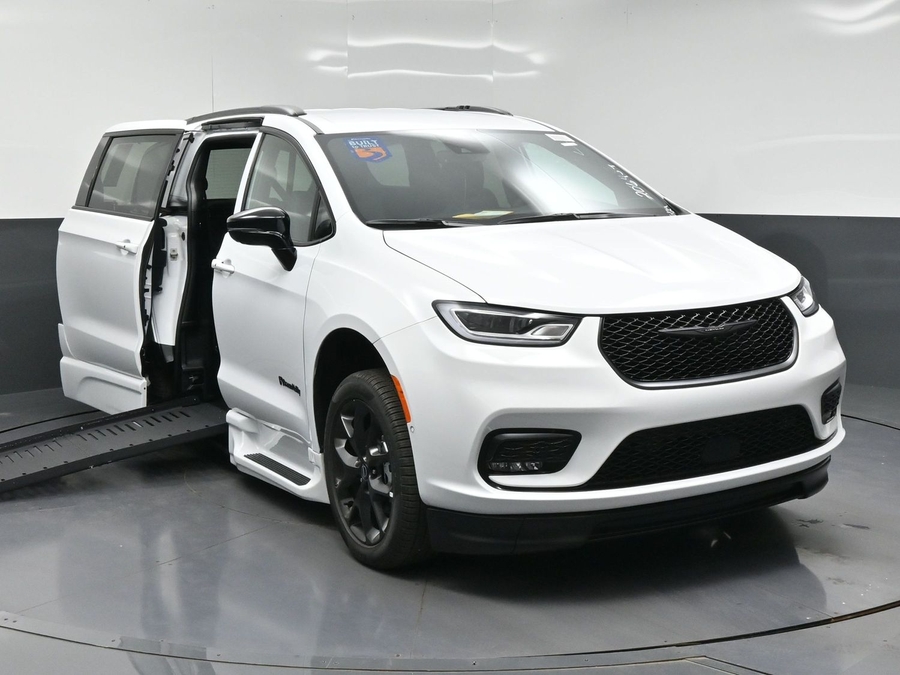 White Chrysler Pacifica with BraunAbility Side Entry Automatic Fold Out conversion