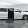 White Chrysler Pacifica with BraunAbility Side Entry Automatic Fold Out conversion