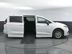 White Chrysler Pacifica with BraunAbility Side Entry Automatic Fold Out conversion