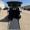 White Toyota Sienna with Driverge Rear Entry Manual Fold Out conversion