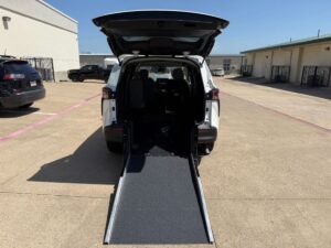 White Toyota Sienna with Driverge Rear Entry Manual Fold Out conversion