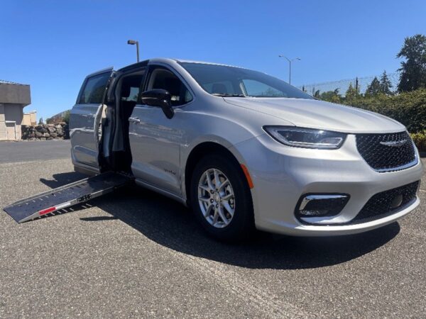 Silver Chrysler Pacifica with Driverge Side Entry Automatic Fold Out conversion